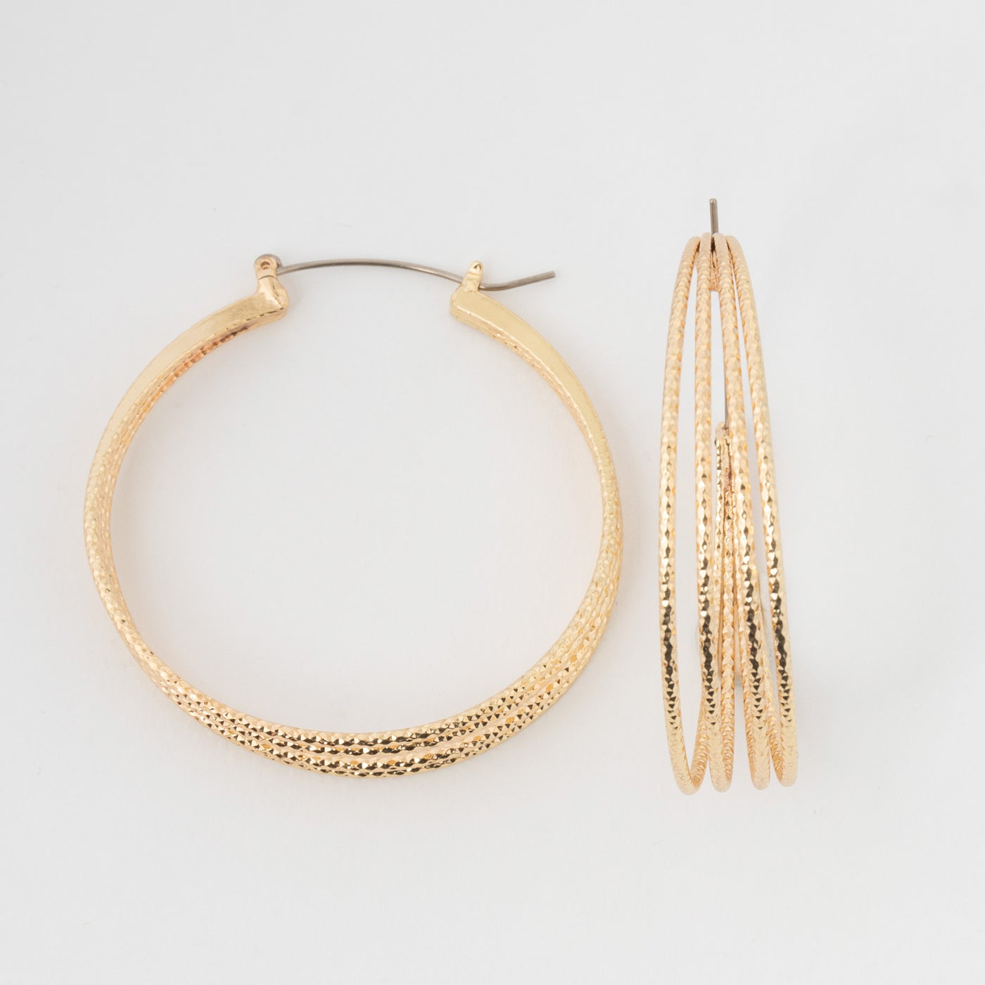 gold sparkle hoops on a white background.