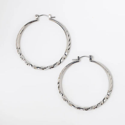 Twisted Hoop Earrings on a white background.