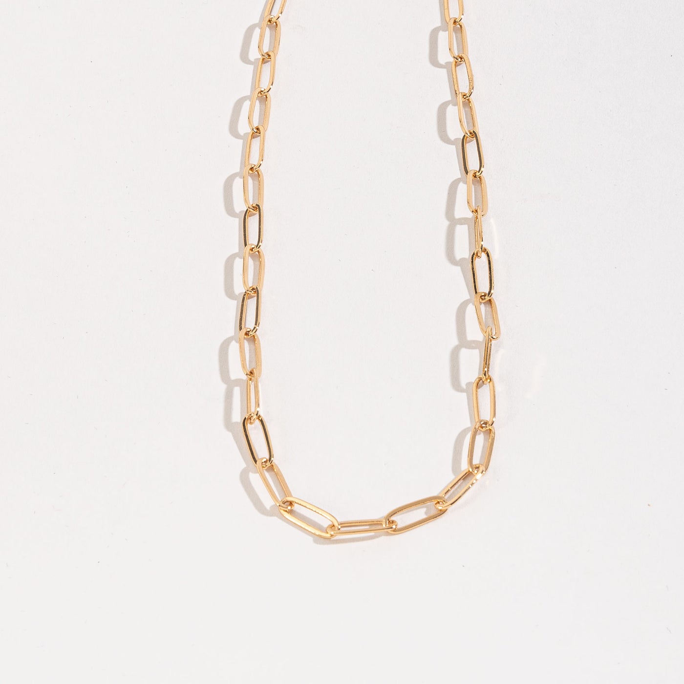 gold paperclip chain necklace.