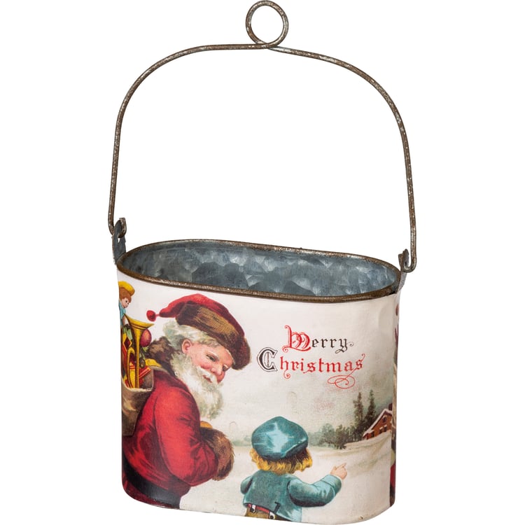 Vintage-style metal hanging bucket with a handle, featuring a printed Christmas scene with Santa Claus and the words 'Merry Christmas' on a white background.