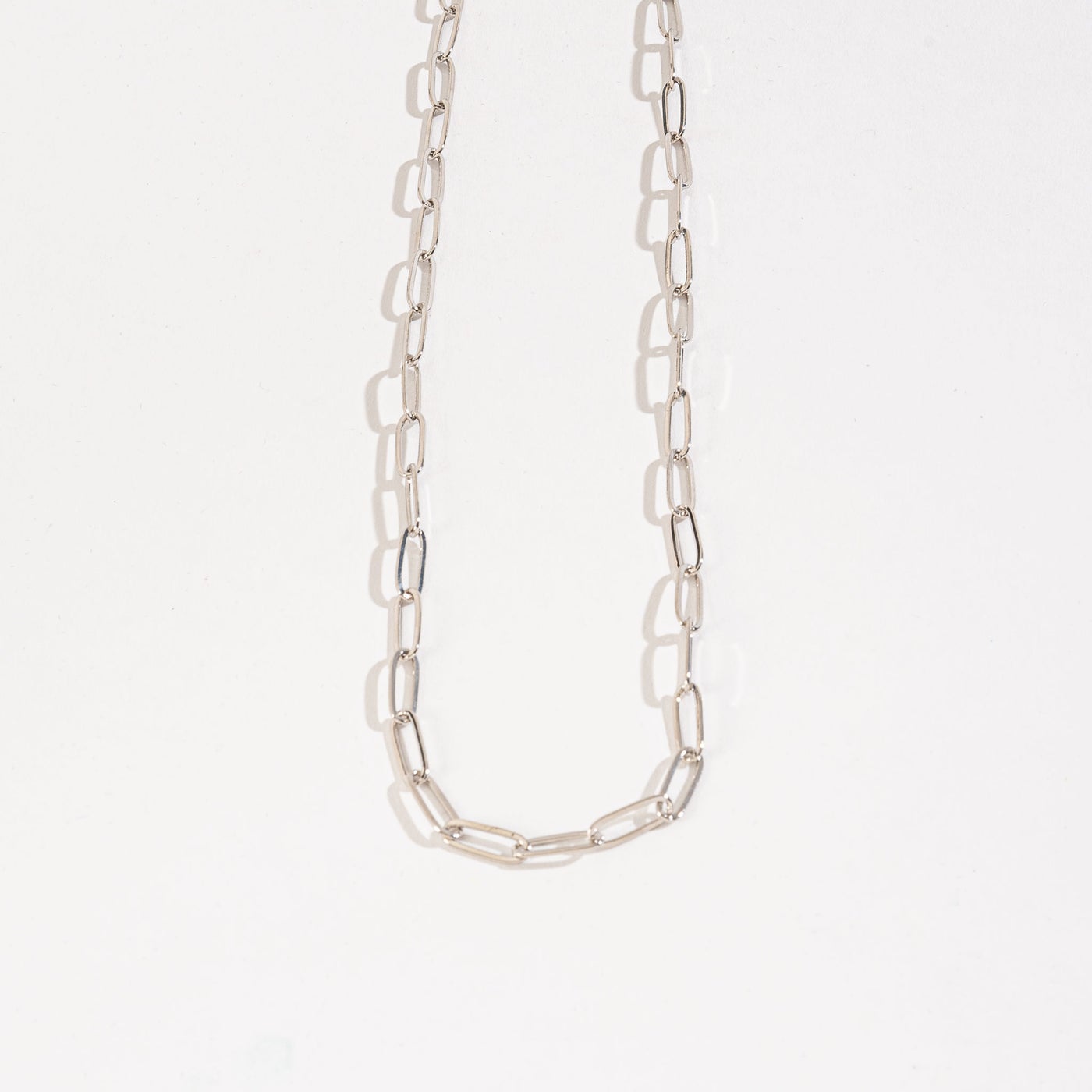 silver paperclip chain necklace.