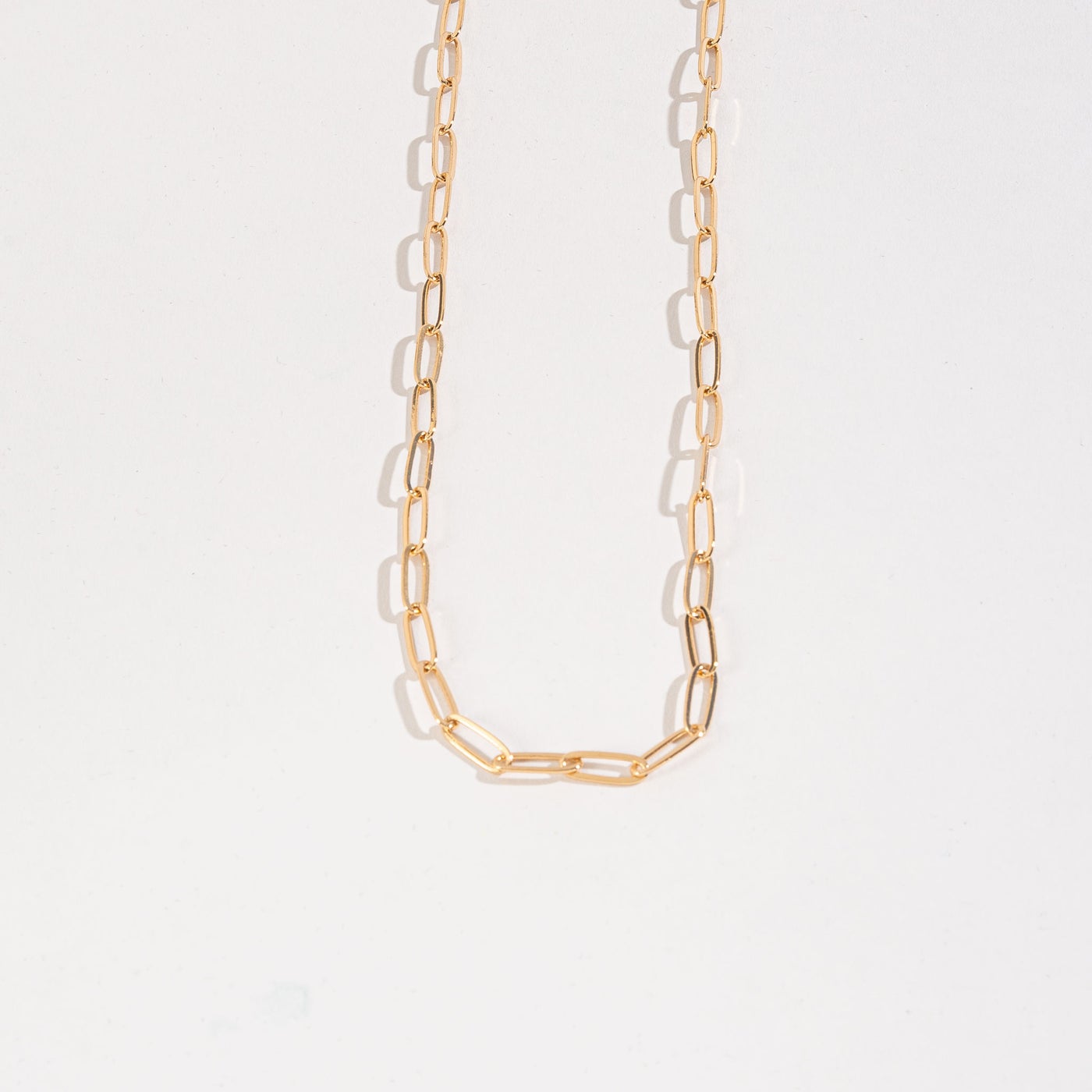 gold paperclip chain necklace.