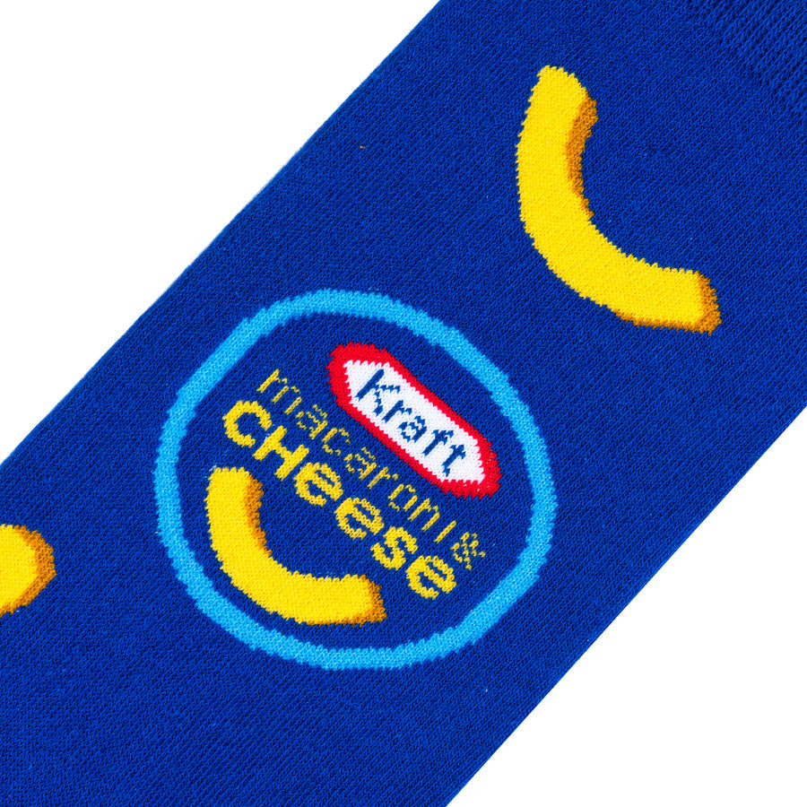 close-up of mac and cheese sock on a white background.