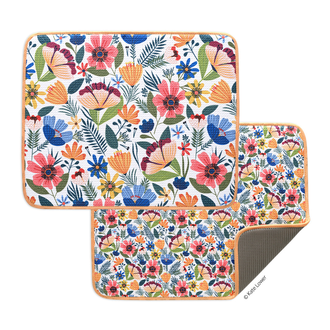 2 field of flowers dish mats on a white background