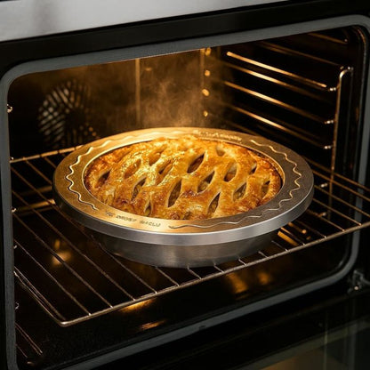 lattice cut pie with Pie Crust Shield on it in a hot oven