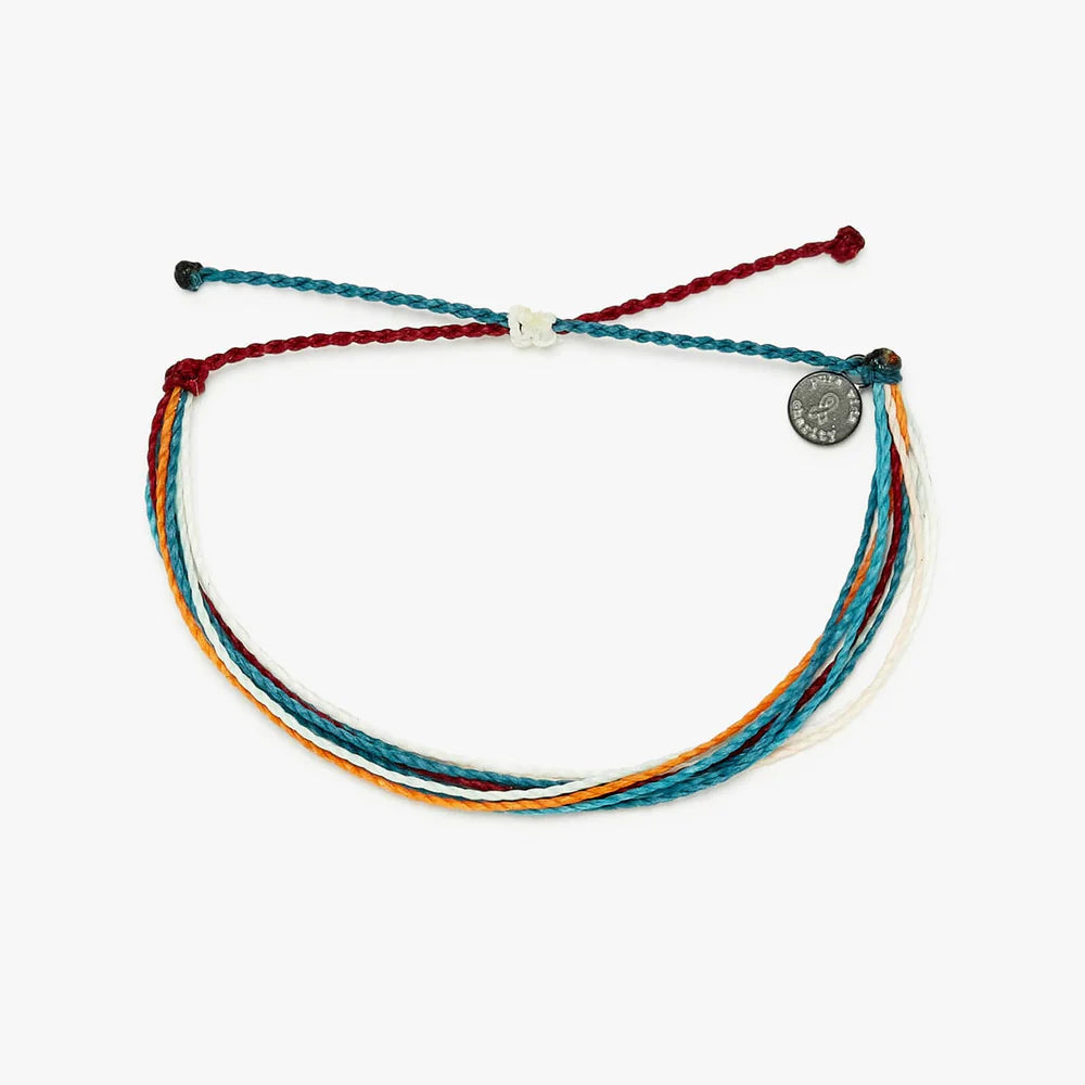 Pura Vida multi strand corded bracelet in varying shades of teal, red, orange, and white with a Pura Vida logo charm