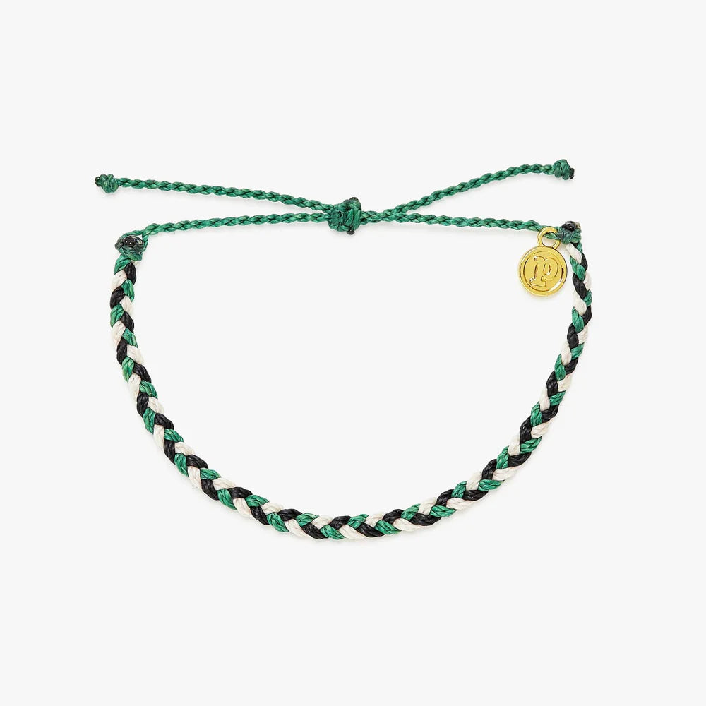 Pura Vida braided bracelet in varying shades of white, black, green with a Pura Vida logo charm