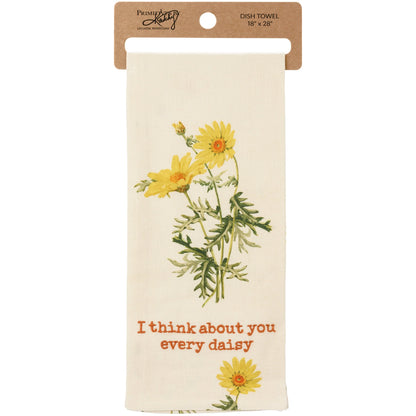 off-white towel with yellow daisy design and "I think about you every daisy" embroidered on it