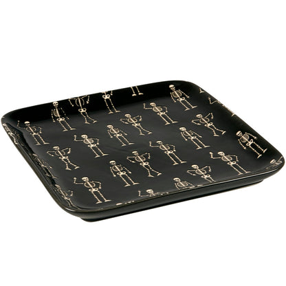 Black tray with skeleton pattern on a white background