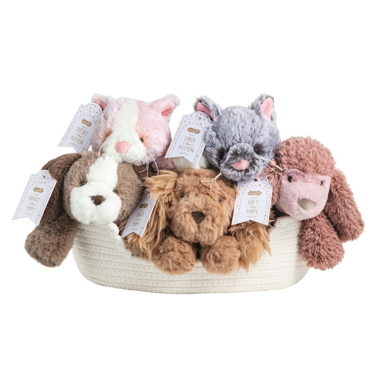 plush puppies and kittens in a white basket