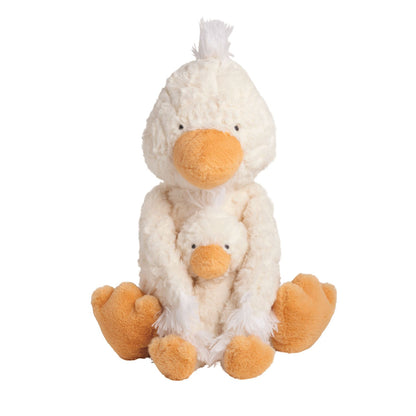 Plush duck toy hugging a smaller duckling on a white background