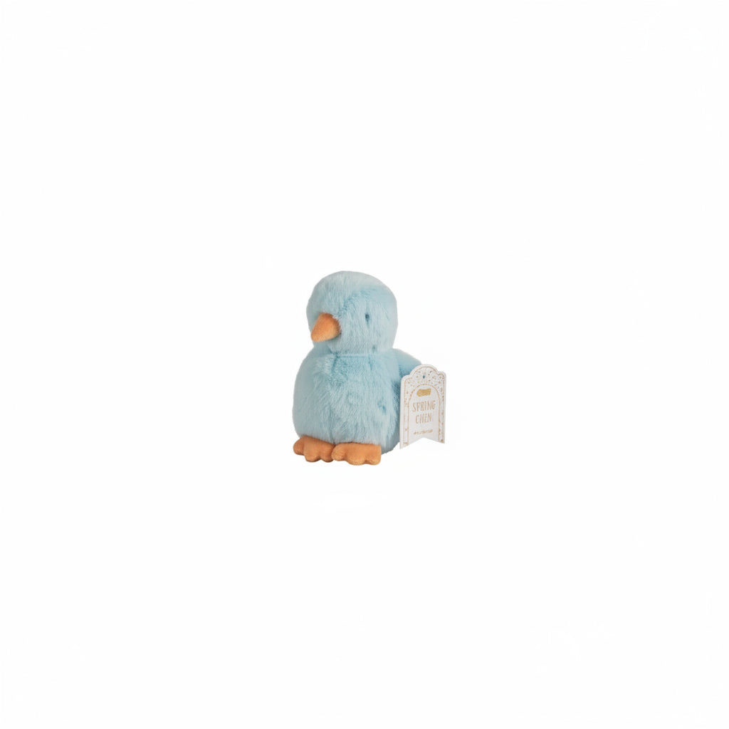 Blue plush chick toy on a white background