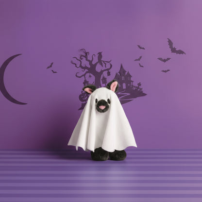 dark plush wearing a ghost costume