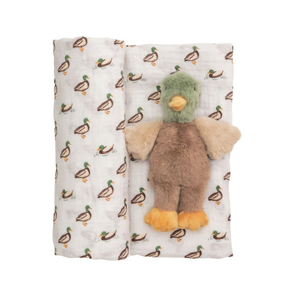 swaddle with mallard ducks on it and a mallard duck plush toy on top of it