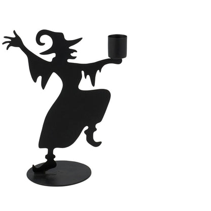  black metal witch silhouette candle holder with circular bases, shown against a plain white background.