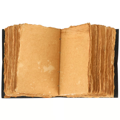 open Good In Every Day Journal showing worn looking pages