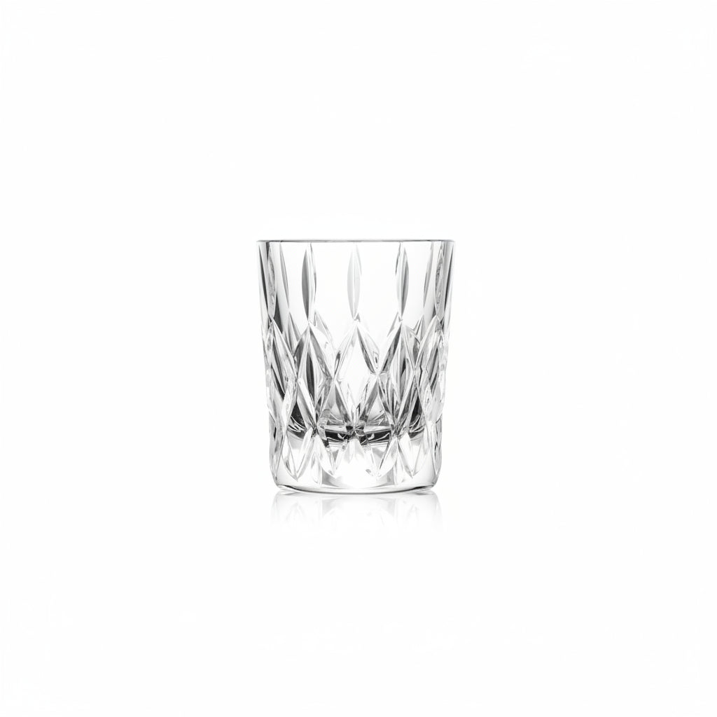 shot glass with cut diamond design shown on a white background