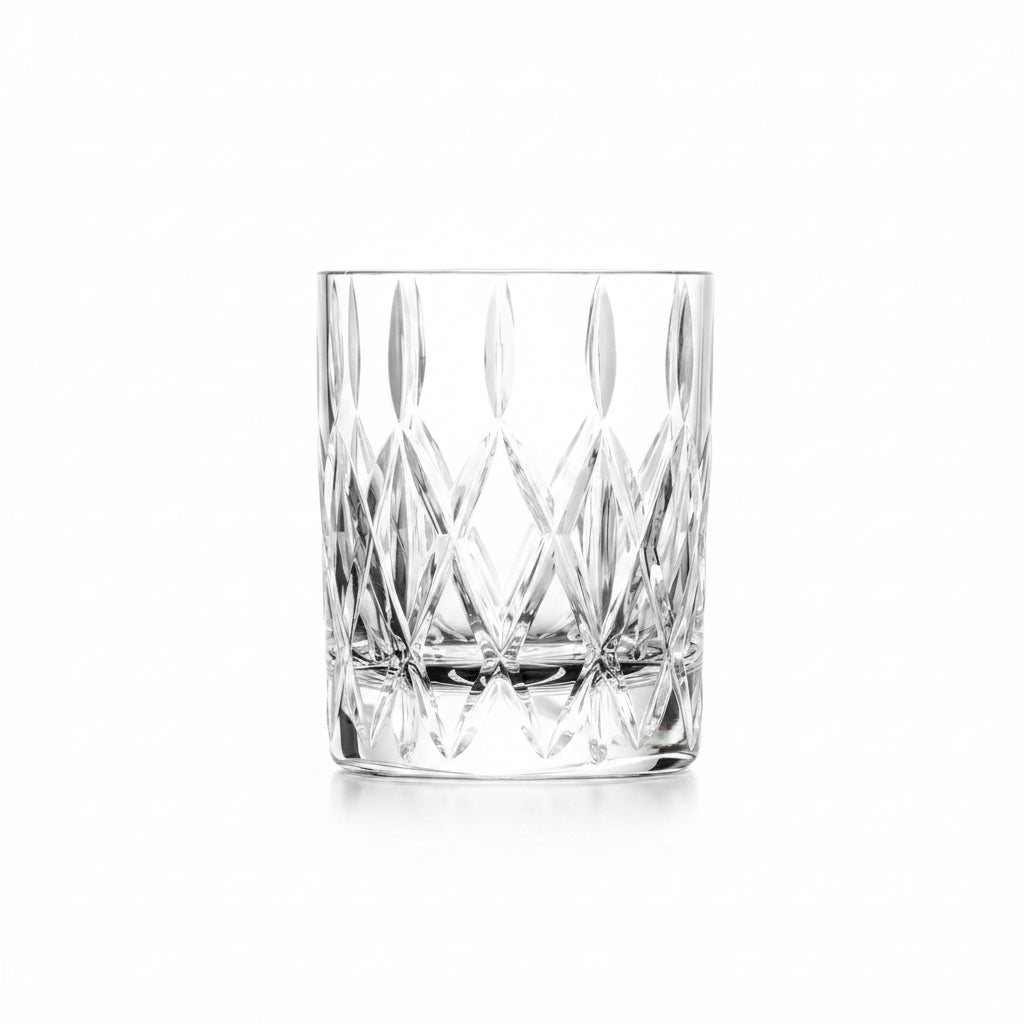 low ball glass with cut diamond design shown on a white background
