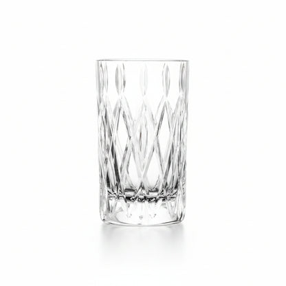 drinking glass with cut diamond design shown on a white background