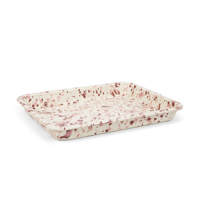 off-white enameled tray painted with shades of pinks splatters.