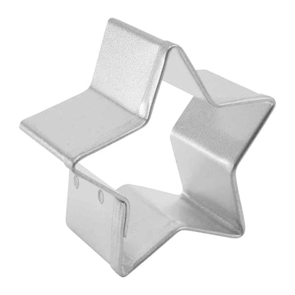 angled view of Metallic star-shaped cookie cutter on a white background