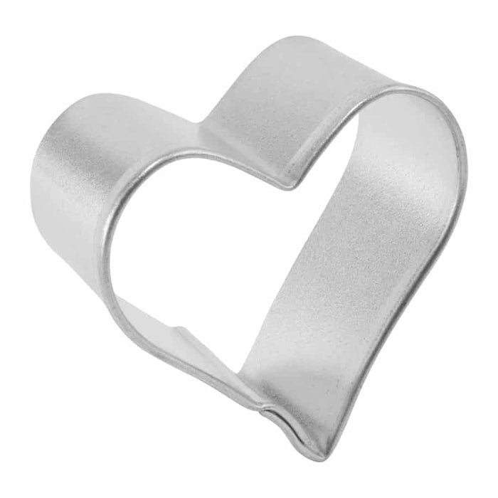 angled view of Heart-shaped cookie cutter on a white background