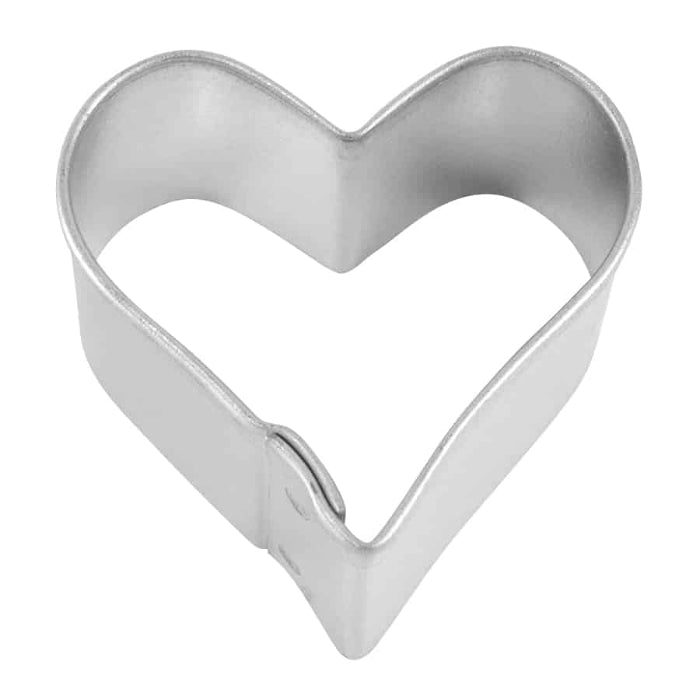 Metallic heart-shaped cookie cutter on a white background