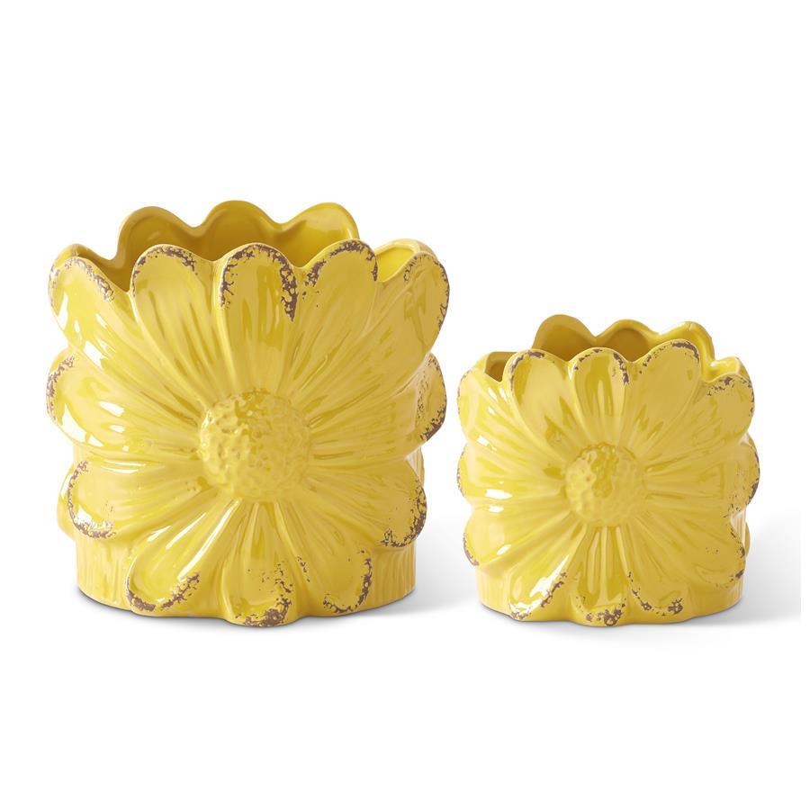 2 different sized yellow flower pots with large sunflowers embossed on them