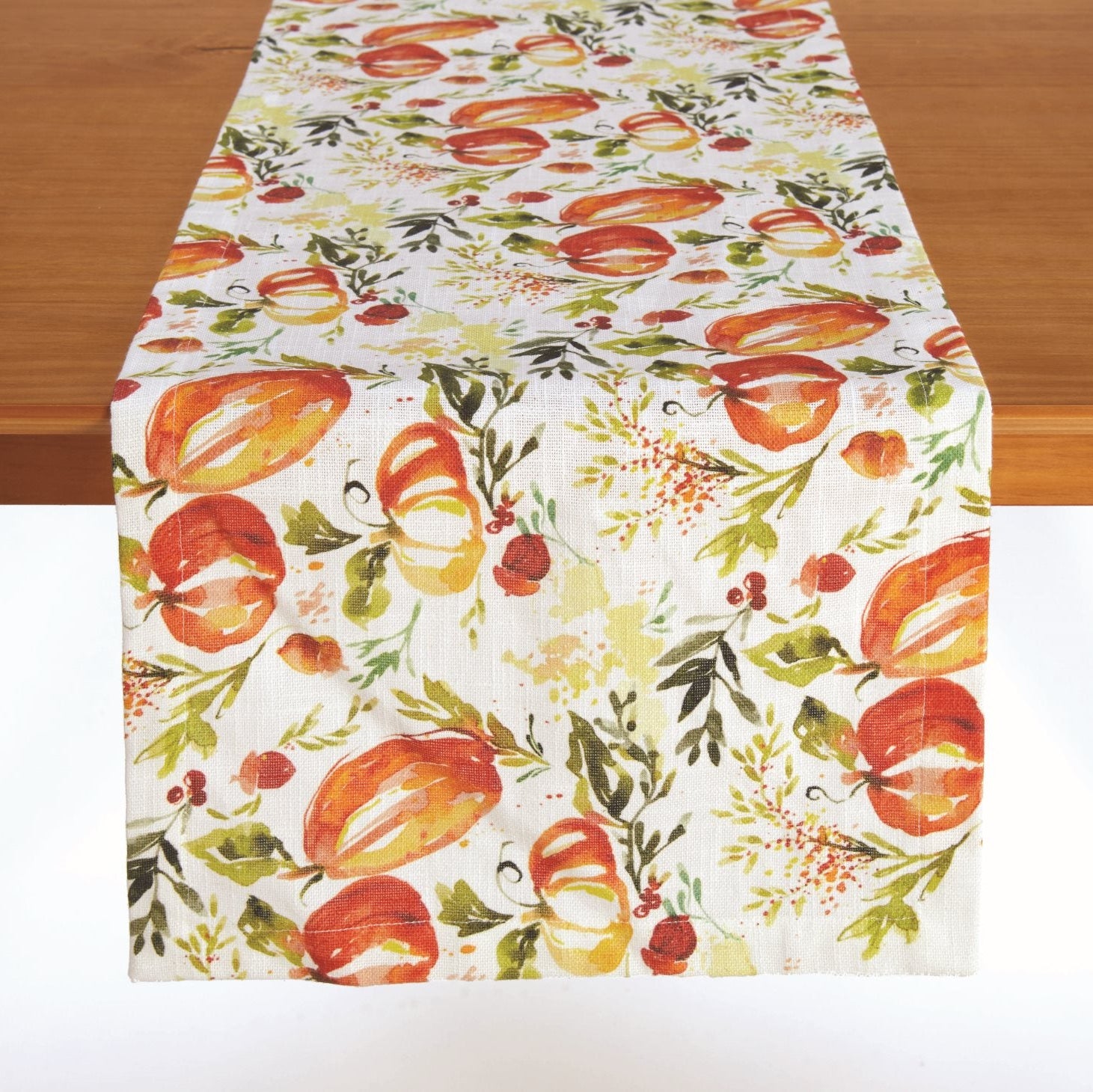 Pumpkin Vine Table Runner draped over a wood table