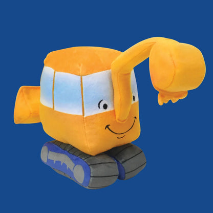 little excavator plush on a blue background 