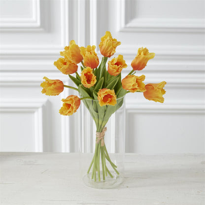 light orange parrot tulips in a glass vase