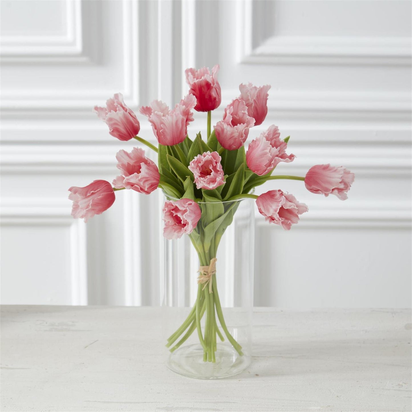 rose parrot tulips in a glass vase