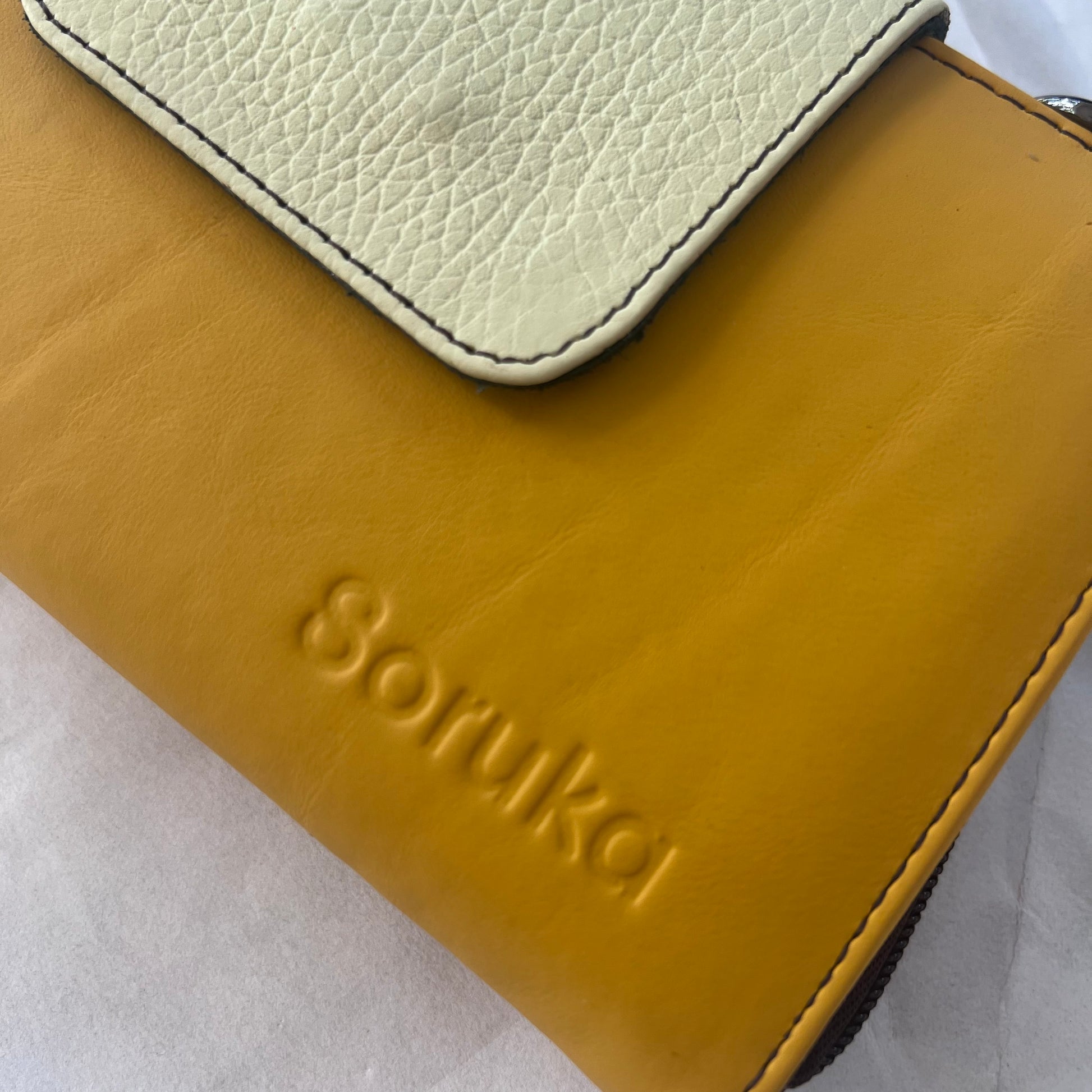 close-up of yellow Beatrice Clutch