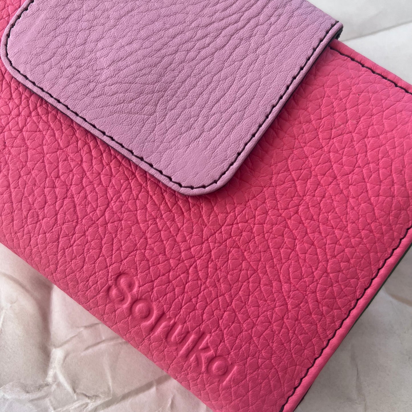 close-up of pink Beatrice Clutch