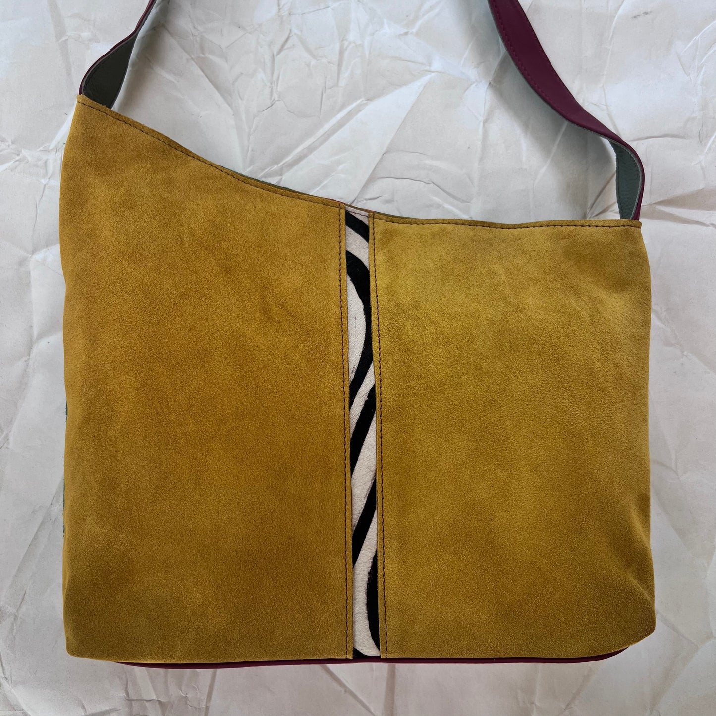 front of honey colored noelia bag.