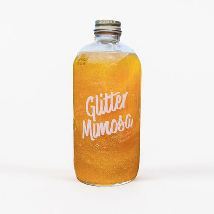Bottle of 'Glitter Mimosa' on a white background