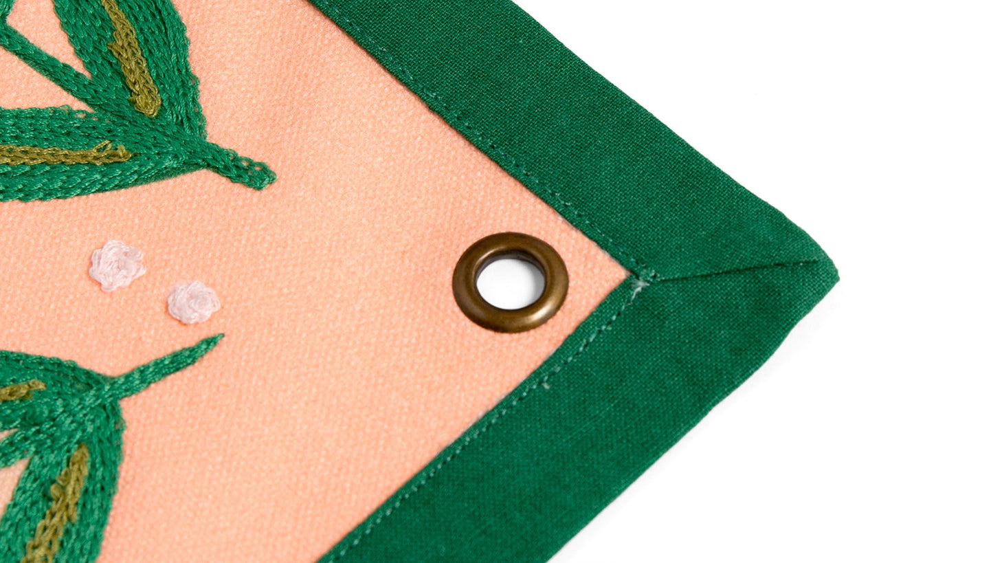 close-up of  Book Nook Canvas Banner corner grommet