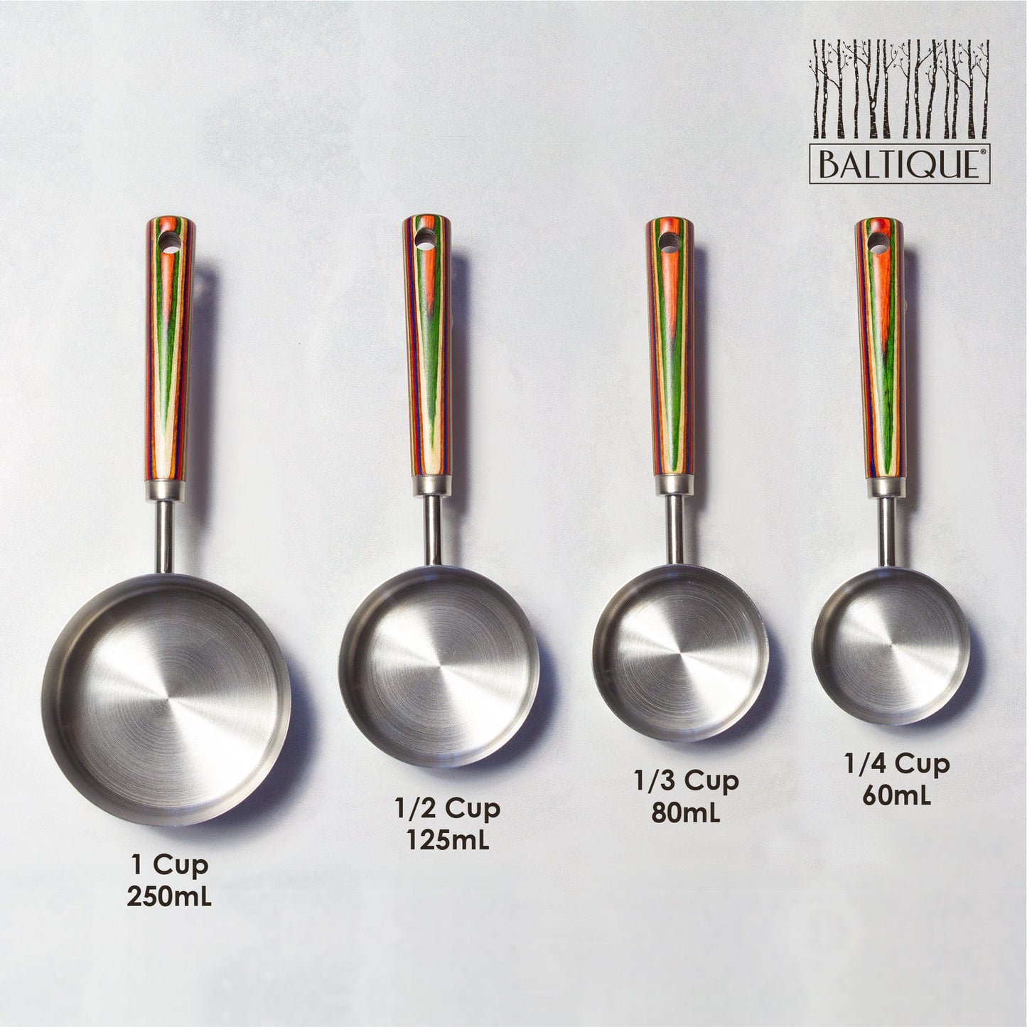 4 sizes of marrakesh measuring cups arranged on a  white surface with the measurements labled.