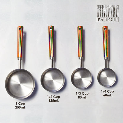 4 sizes of marrakesh measuring cups arranged on a  white surface with the measurements labled.