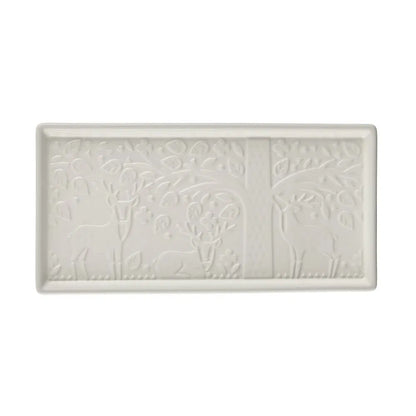 ceramic tray embossed with deer in the forest scene.