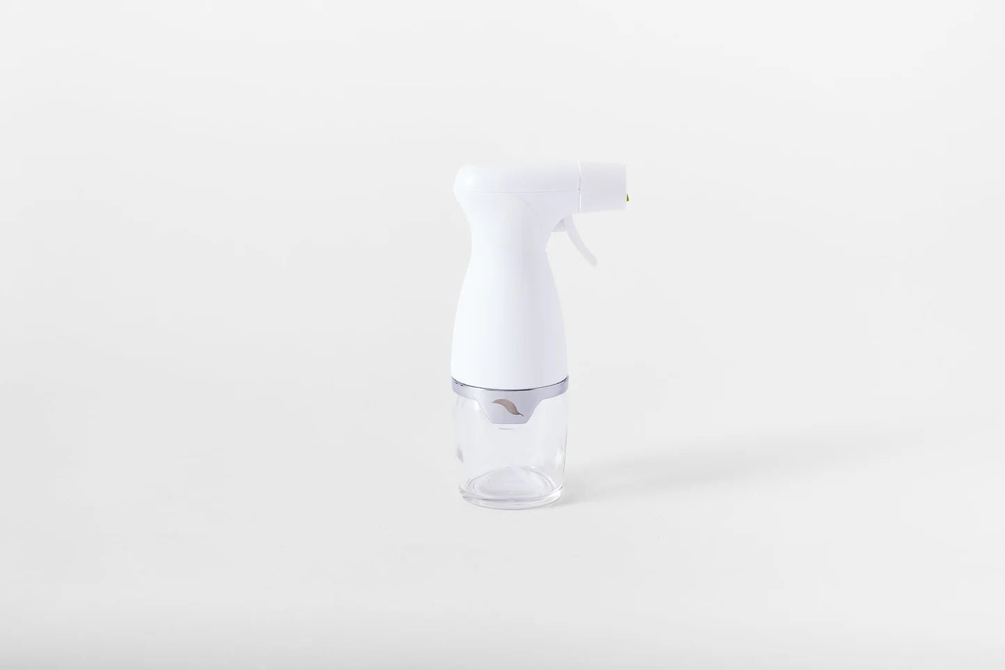White spray bottle on a white background