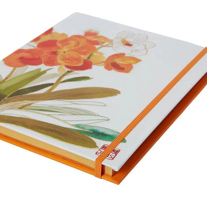 side view of Notebook with floral design showing gold page edges