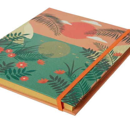 side view of Notebook with a tropical design and gold page edges