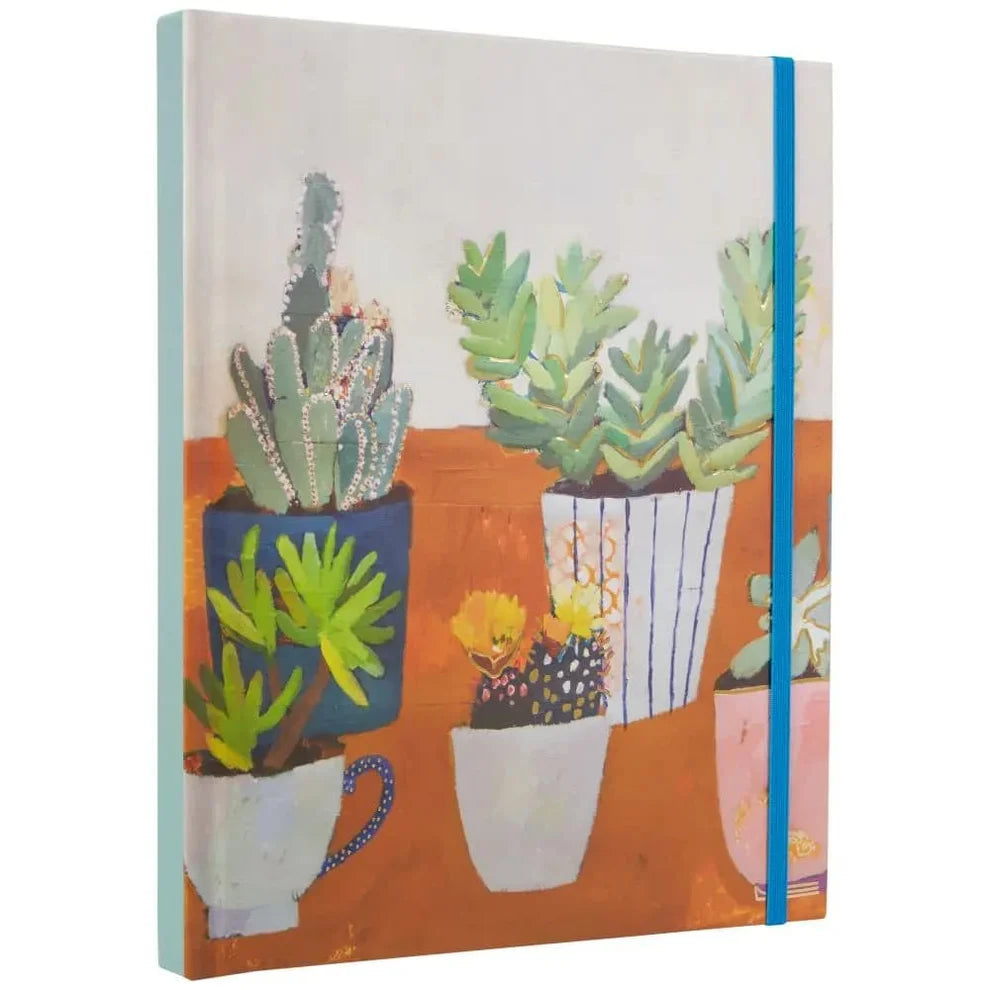 angled view of Notebook with illustrations of potted plants on a white background