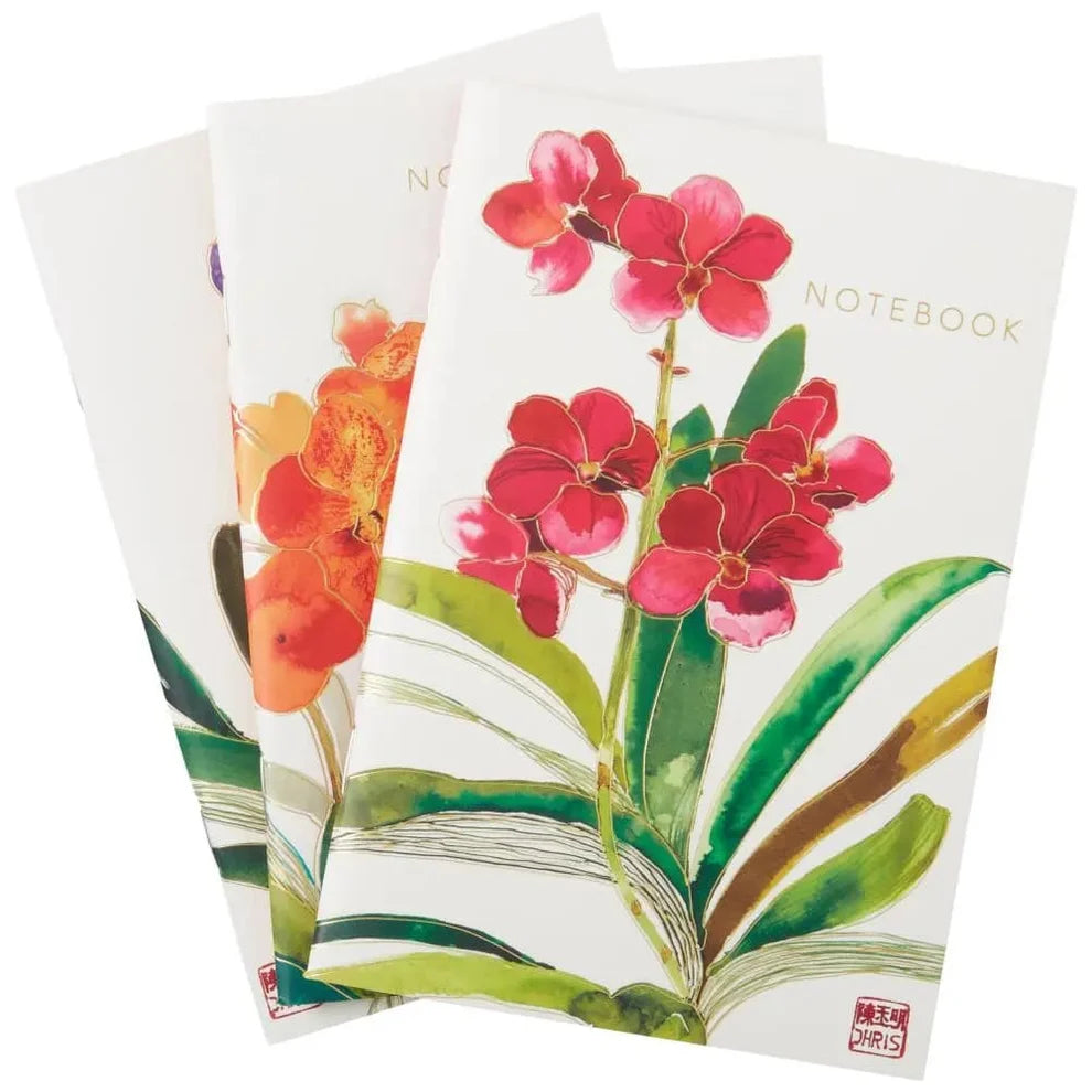 Set of 3 notebooks with orchid designs on the covers