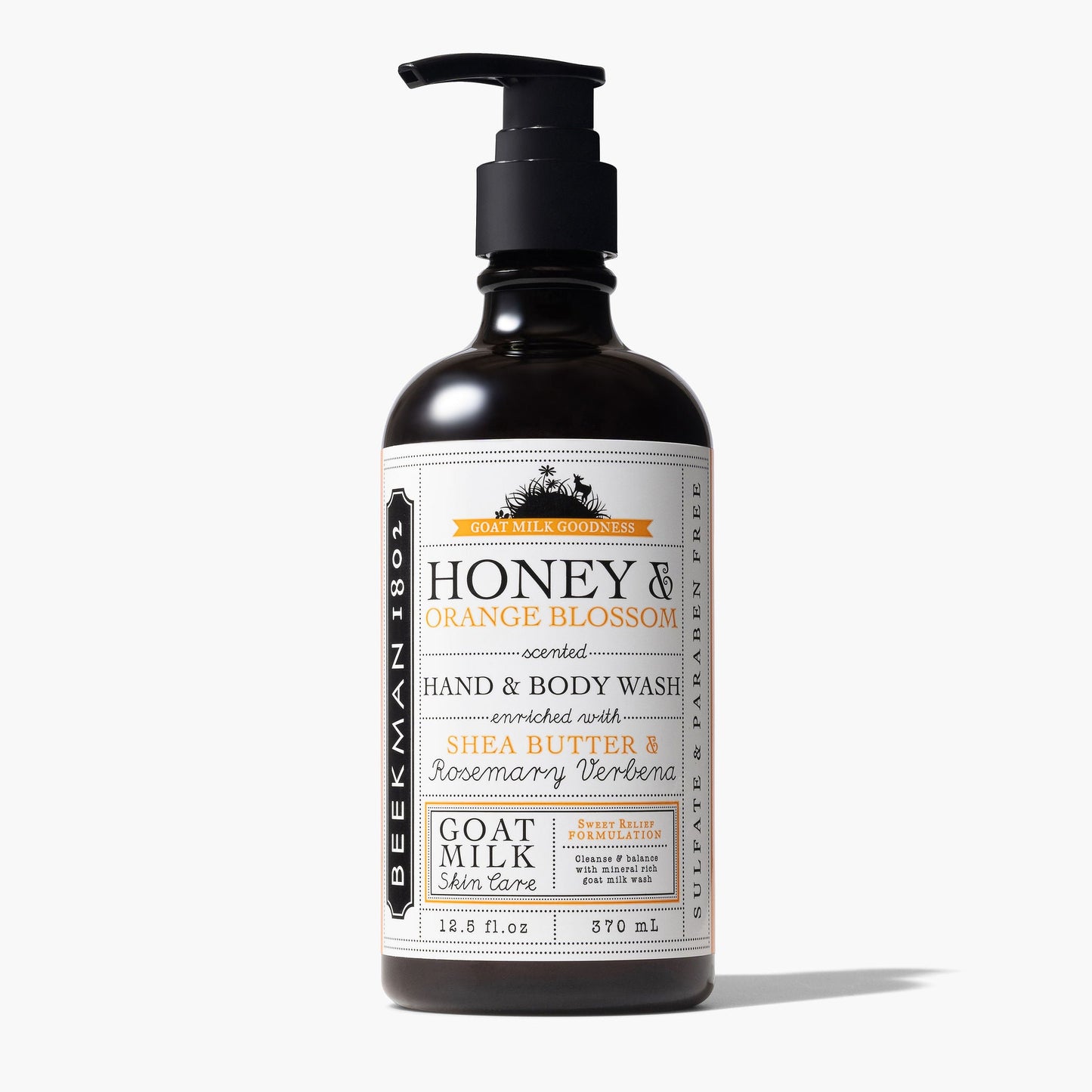 pump bottle of honey and orange blossom hand and body wash on a white background.