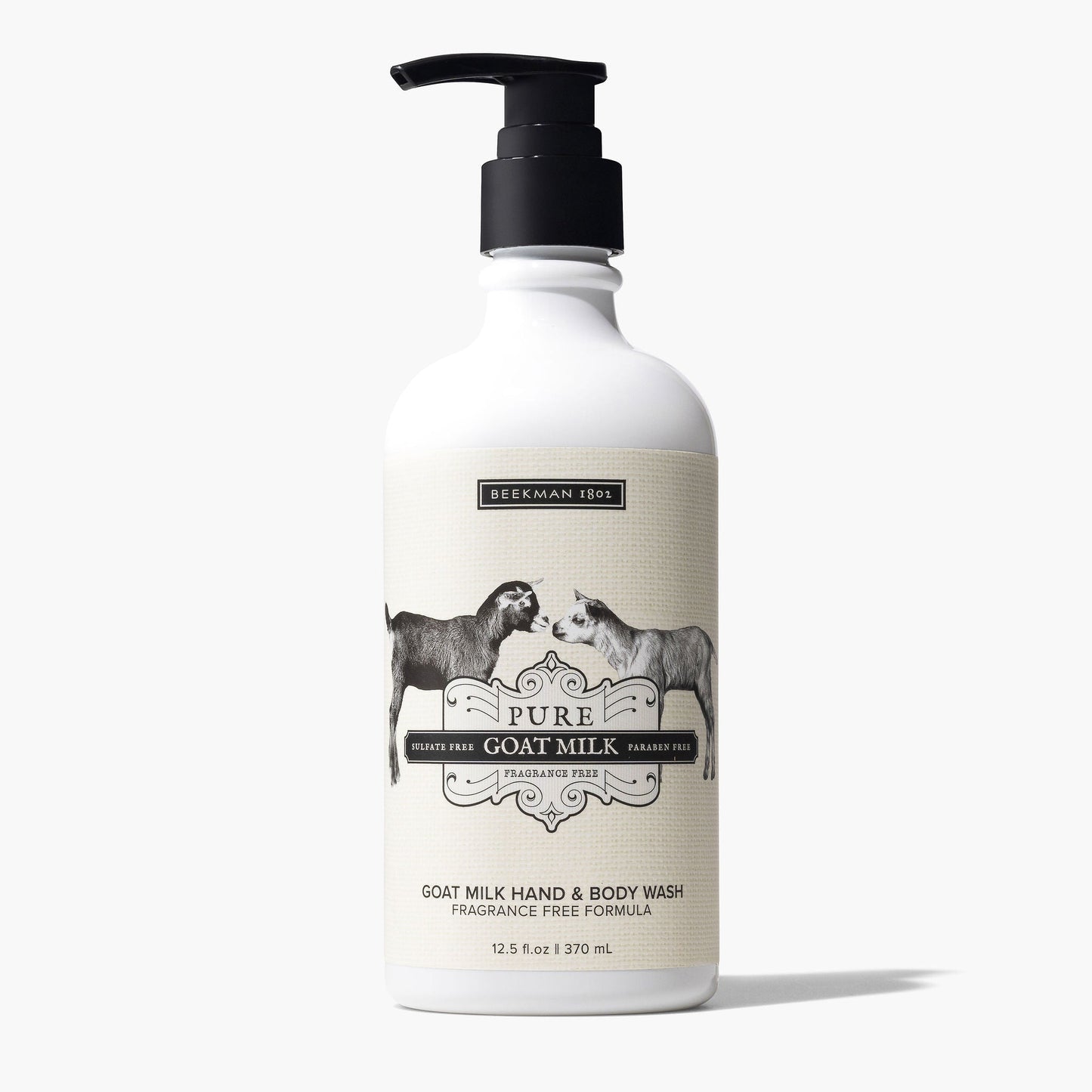 pump bottle of pure goat milk hand and body lotion with 2 goat drawing on the label.