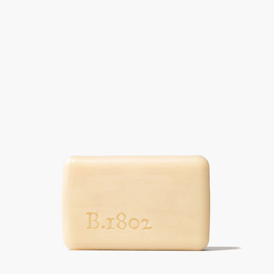 unwrapped bar of soap indented with "b.1802".