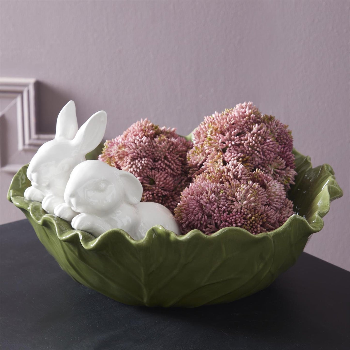 cabbage bowl with rabbits and flower orbs in the bowl for decoration