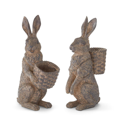 2 brown resin bunny figurines one carring a basket on its front and the other on its back